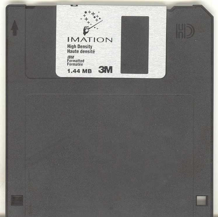 An Imation 3.5-inch high-density floppy disk labeled 1.44 MB
